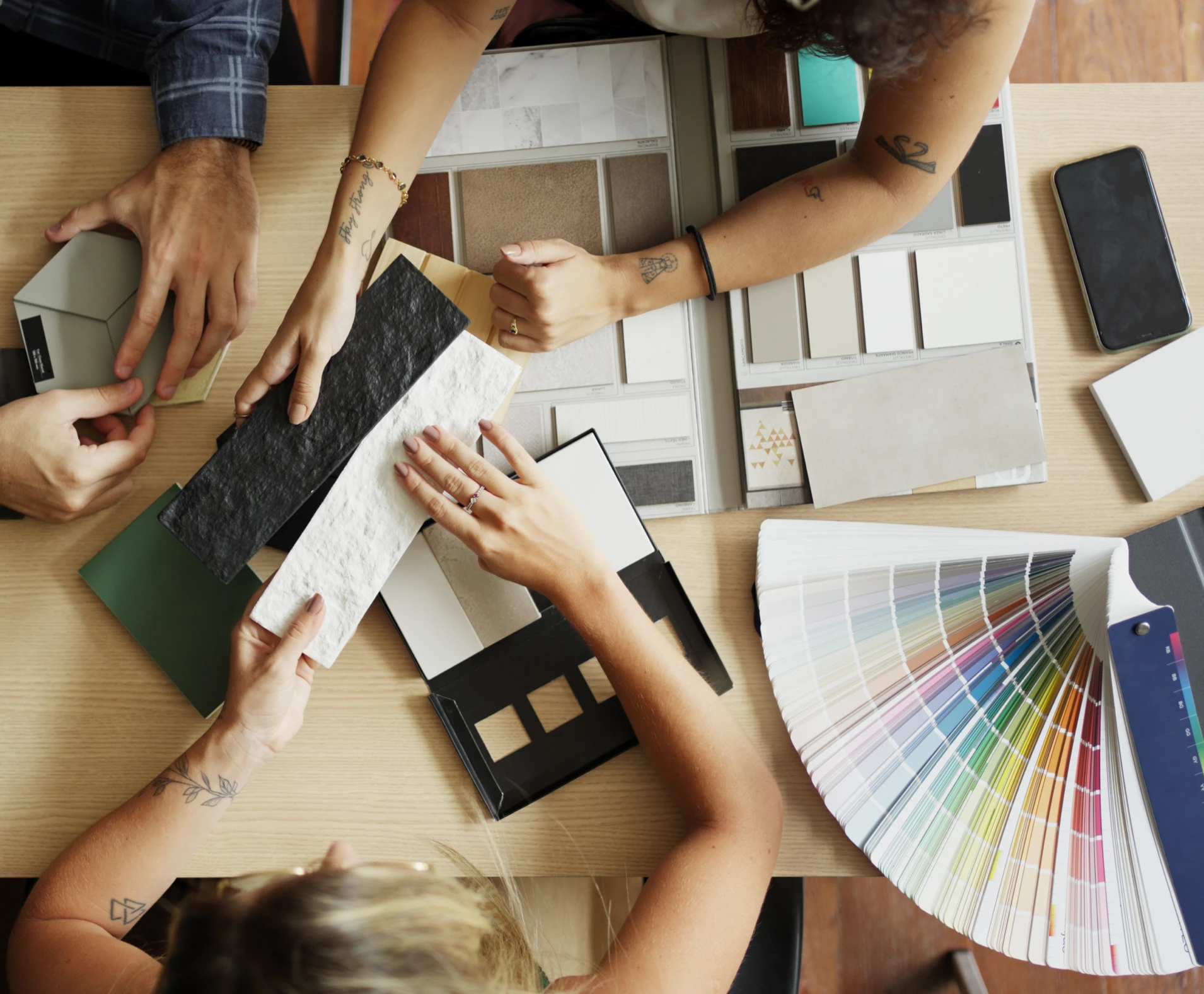 People choosing colors and materials for design.