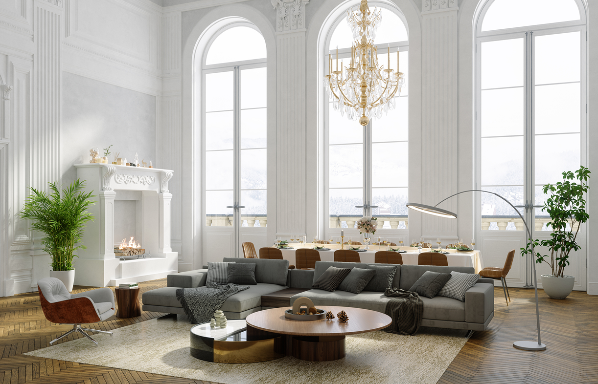 Elegant living room with chandelier and fireplace.
